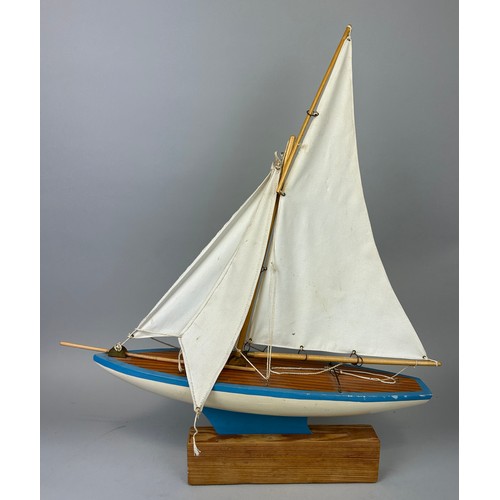 782 - A PAINTED WOODEN MODEL OF A SAILING BOAT ON WOODEN STAND,

73cm x 60cm