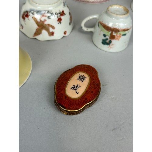 299 - A COLLECTION OF CHINESE WINE CUPS INCLUDING ONE ARMORIAL ALONG WITH A SMALL PLAQUE,