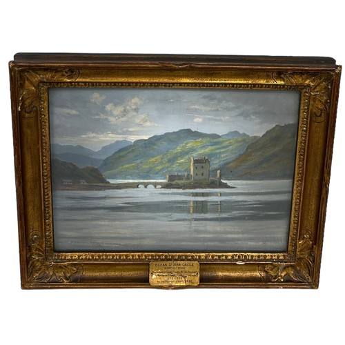 420 - WILLIAM MAXWELL REEKIE (ENGLISH 1869 - 1948): AN OIL PAINTING ON CANVAS DEPICTING EILEAN DONAN CASTL... 