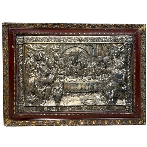 781 - A REPOUSSE WHITE METAL FRIEZE DEPICTING THE LAST SUPPER, 

84cm x 61cm framed.