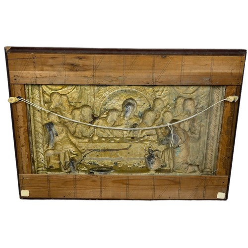 781 - A REPOUSSE WHITE METAL FRIEZE DEPICTING THE LAST SUPPER, 

84cm x 61cm framed.