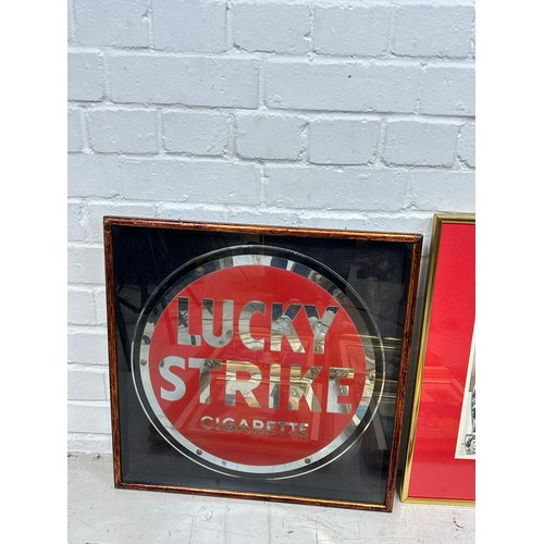 775 - TOBACCIANA: A GROUP OF FRAMED LUCKY STRIKE CIGARETTES ADVERTISING, TO INCLUDE A METAL SIGN, 

Each f... 