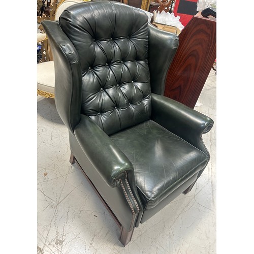 765 - A GREEN LEATHER BUTTON BACK RECLINING ARMCHAIR, 

110cm x 83cm x 83cm