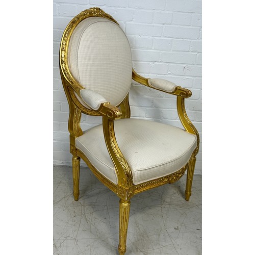 760 - A GEORGE III STYLE GILT WOOD SINGLE ARMCHAIR, 

With neutral chequered fabric upholstered back, seat... 