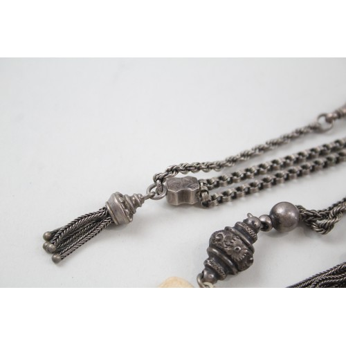 192 - TWO SILVER ANTIQUE ALBERTINA CHAINS WITH TASSELS,

Weight: 22gms