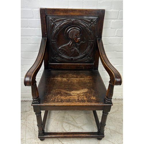 769A - AN OAK WAINSCOT DESIGN CHAIR WITH CARVED BACK PANEL DEPICTING A LADY, 

100cm x 55cm x 55cm