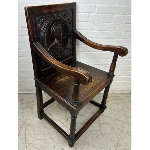 769A - AN OAK WAINSCOT DESIGN CHAIR WITH CARVED BACK PANEL DEPICTING A LADY, 

100cm x 55cm x 55cm