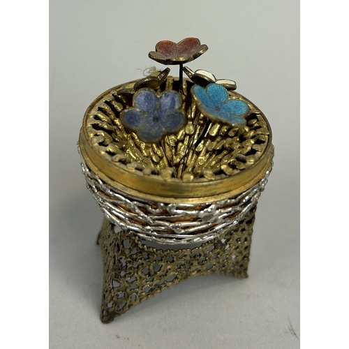 8 - A STUART DEVLIN SILVER AND GILT SURPRISE EGG AND STAND, OPENING TO REVEAL ENAMEL FLOWERS 9.5cm H inc... 