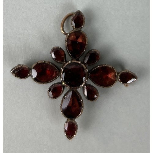 4 - A GARNET CROSS PENDANT BROOCH CIRCA 1820'S Set with pear-shaped and circular mixed-cut garnets, moun... 