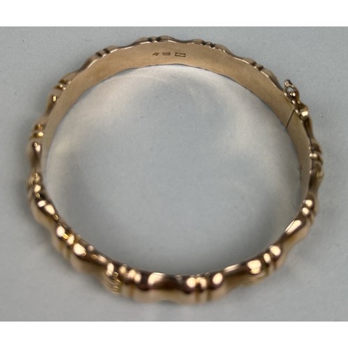 11 - A CHINESE 14CT GOLD FAUX BAMBOO BANGLE Weight: 36.5gms