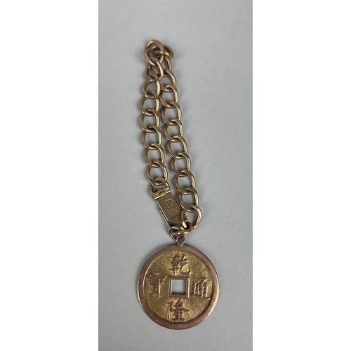 15 - A CHINESE 18CT GOLD CHAIN LINK BRACELET WITH CURRENCY CHARM Weight: 34.6gms