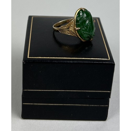 21 - A CHINESE 14CT GOLD RING SET WITH JADE BEZEL 4.1gms