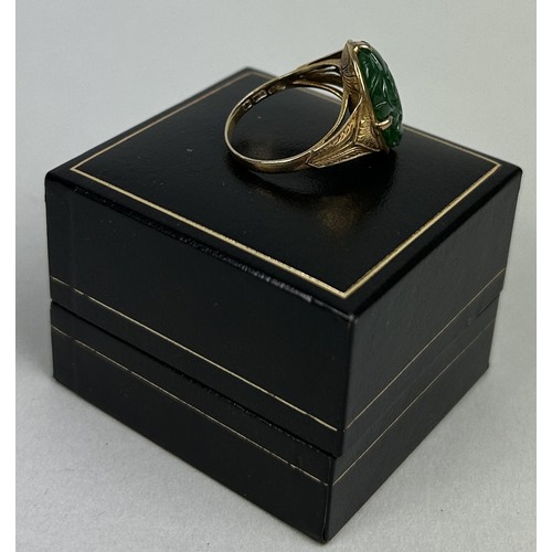 21 - A CHINESE 14CT GOLD RING SET WITH JADE BEZEL 4.1gms