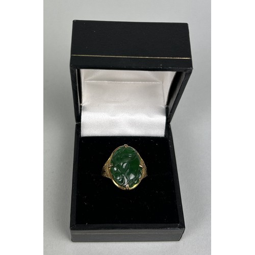 21 - A CHINESE 14CT GOLD RING SET WITH JADE BEZEL 4.1gms