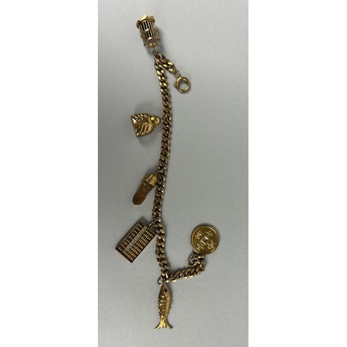 17 - A CHINESE 14CT GOLD CHARM BRACELET Weight: 17.65gms