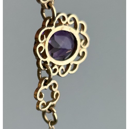 27 - A 9CT GOLD AND AMETHYST NECKLACE Weight: 8.9gms