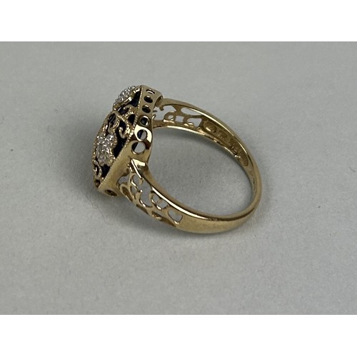 29 - AN 18CT GOLD RING Weight: 2.6gms