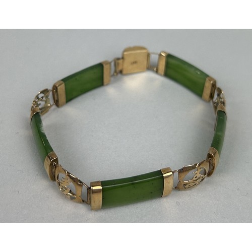 25 - A CHINESE 14CT GOLD AND JADE BRACELET Weight: 12.6gms