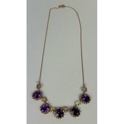 27 - A 9CT GOLD AND AMETHYST NECKLACE Weight: 8.9gms