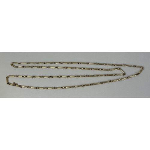 33 - AN 18CT GOLD VICTORIAN LADIES CHAIN 59gms 67cm L