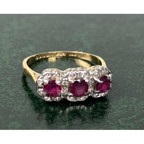 38 - AN 18CT GOLD ENGAGEMENT RING SET WITH RUBIES AND DIAMONDS Weight: 3.5gms