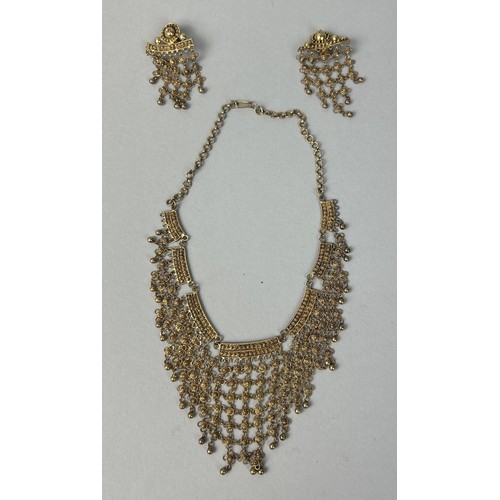 34 - A HIGH CARAT GOLD INDIAN NECKLACE AND EARRINGS SET (3) Weight: 47gms