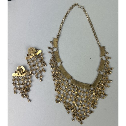 34 - A HIGH CARAT GOLD INDIAN NECKLACE AND EARRINGS SET (3) Weight: 47gms