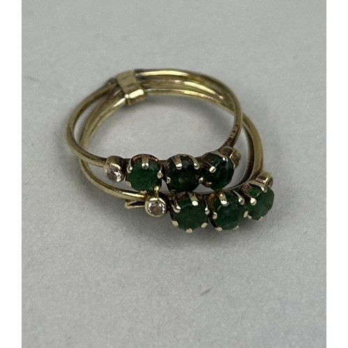 47 - A TRILOGY OF 14CT GOLD RINGS SET WITH EMERALDS AND WHITE STONES Each marked 585. Weight: 3.4gms