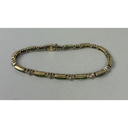 42 - A LADIES 14CT GOLD, DIAMOND AND EMERALD BRACELET Weight: 9.75gms