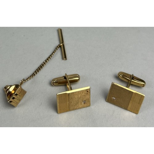 46 - A PAIR OF 14CT GOLD CUFFLINKS EACH SET WITH ONE SMALL DIAMOND Weight: 8.4gms Along with an untested ... 