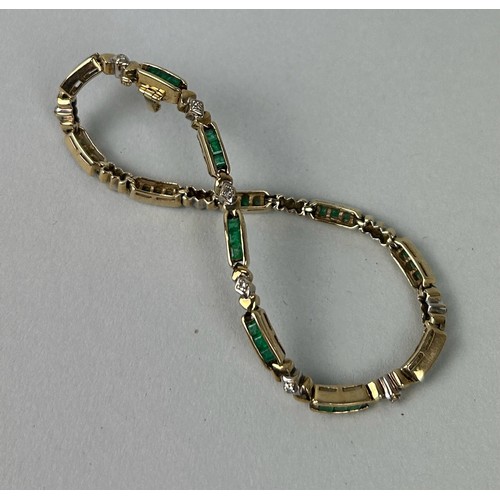 42 - A LADIES 14CT GOLD, DIAMOND AND EMERALD BRACELET Weight: 9.75gms