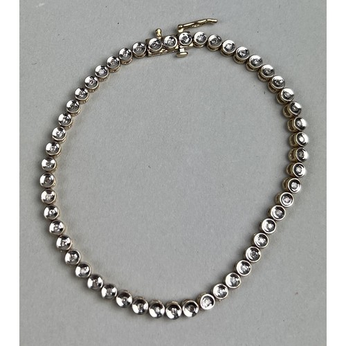 44 - AN 18CT GOLD BRACELET SET WITH DIAMONDS, 18cm length. Weight: 7.5gms