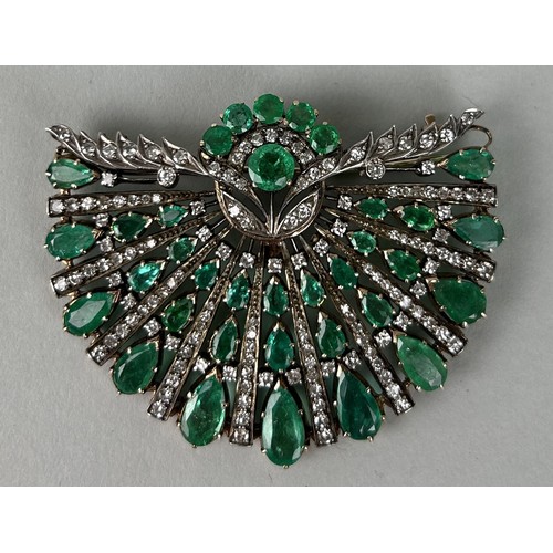 41 - AN ART DECO LADIES GOLD EMERALD AND DIAMOND FLORAL BROOCH 5.5cm x 4.5cm Weight: 21.04gms Provenance:... 