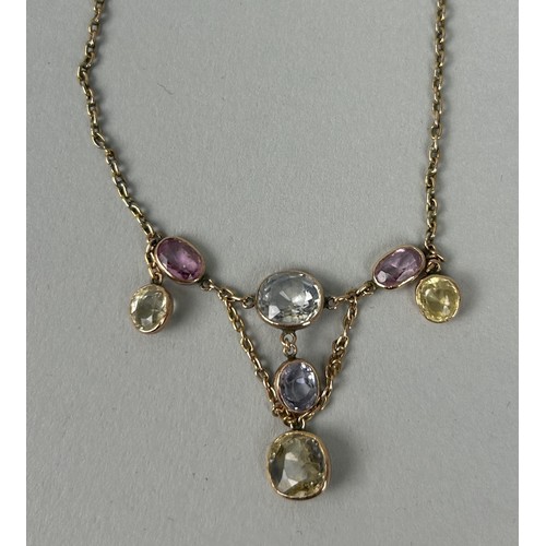 43 - AN ANTIQUE 9CT GOLD NECKLACE SET WITH COLOURED SAPPHIRES The clasp stamped 375. Weight: 6.6gms