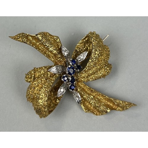 49 - AN 18CT GOLD RIBBON BROOCH SET WITH SAPPHIRES AND DIAMONDS, WITH ASPREY AND CO BOX Weight: 16.8gms