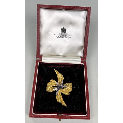 49 - AN 18CT GOLD RIBBON BROOCH SET WITH SAPPHIRES AND DIAMONDS, WITH ASPREY AND CO BOX Weight: 16.8gms