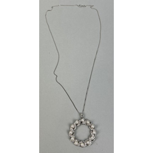 64 - A WHITE GOLD PENDANT AND CHAIN SET WITH PEARLS Weight: 9.9 gms