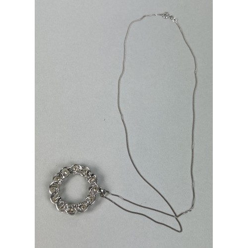 64 - A WHITE GOLD PENDANT AND CHAIN SET WITH PEARLS Weight: 9.9 gms