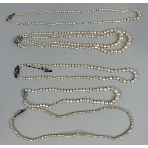 73 - THREE MIKIMOTO PEARL NECKLACES Two with 925 silver clasp, one with 9ct gold clasp.