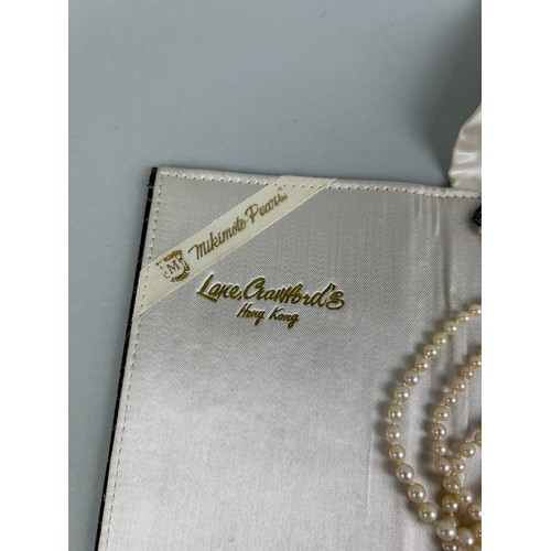 73 - THREE MIKIMOTO PEARL NECKLACES Two with 925 silver clasp, one with 9ct gold clasp.