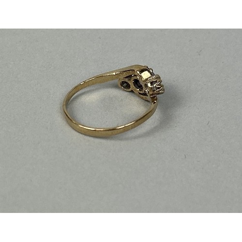 77 - AN ANTIQUE NATURAL CEYLON SAPPHIRE THREE STONE 9CT GOLD RING, WITH TWO DIAMONDS Weight: 1.6 gms