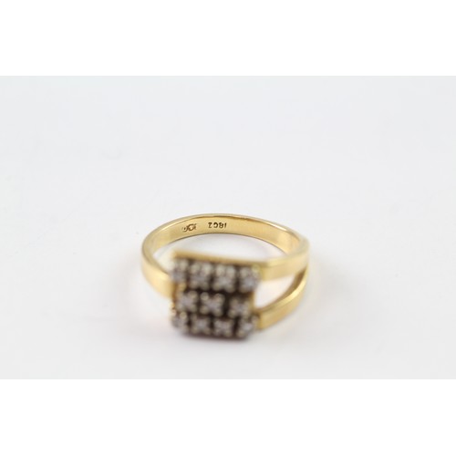 86 - AN 18CT GOLD AND DIAMOND RING Weight: 5.3gms