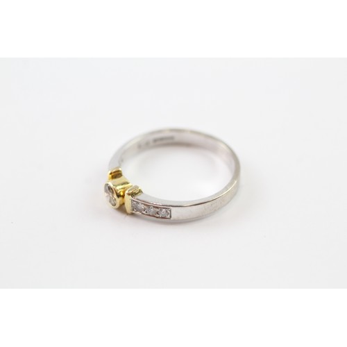 88 - AN 18CT GOLD 'BROWN' DIAMOND RING SINGLE STONE RING WITH DIAMOND SET SHOULDERS Weight: 3.5gms