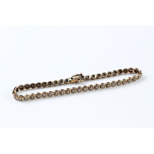 87 - A 9CT GOLD AND DIAMOND BRACELET Weight: 7.8gms