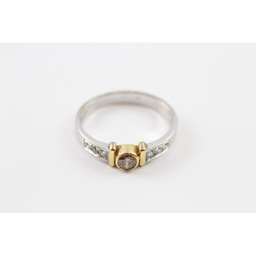 88 - AN 18CT GOLD 'BROWN' DIAMOND RING SINGLE STONE RING WITH DIAMOND SET SHOULDERS Weight: 3.5gms