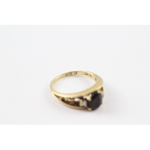 97 - A 14CT GOLD GARNET AND DIAMOND RING Weight: 3.7gms