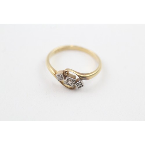 93 - AN 18CT GOLD AND PLATINUM ART DECO DIAMOND THREE STONE RING Weight: 2.4gms