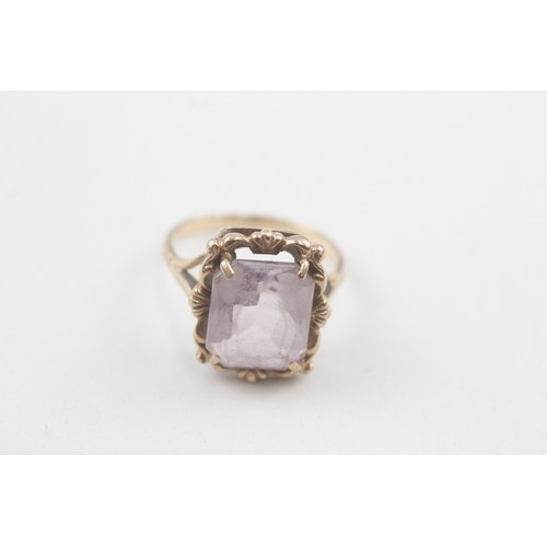 104 - A 9CT GOLD VINTAGE AMETHYST DRESS RING Weight: 4.5gms