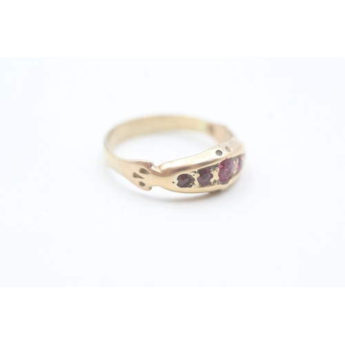 109 - A 9CT GOLD RUBY FIVE STONE RING Weight: 3.5gms