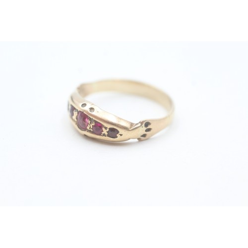 109 - A 9CT GOLD RUBY FIVE STONE RING Weight: 3.5gms